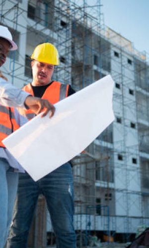 Portrait of architect and engineer with experience in multi-story building construction